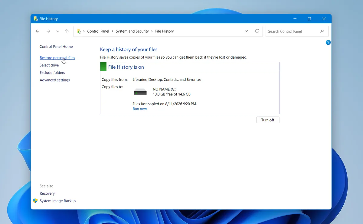 File History window on Windows with the Restore personal files link highlighted