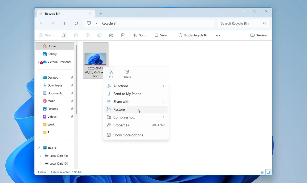 Restore option in the Windows 11 Recycle Bin context menu for a deleted screenshot