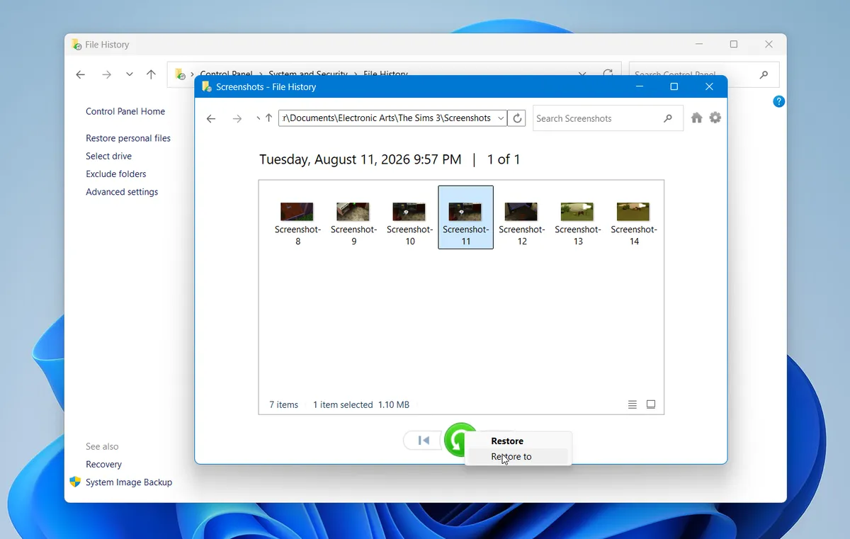 Restoring selected screenshots from a File History backup with the green restore button